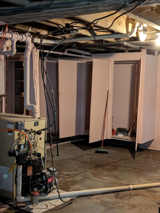 1105 Rte 390, Cresco, PA 18326 - unfinished below grade area featuring a heating unit