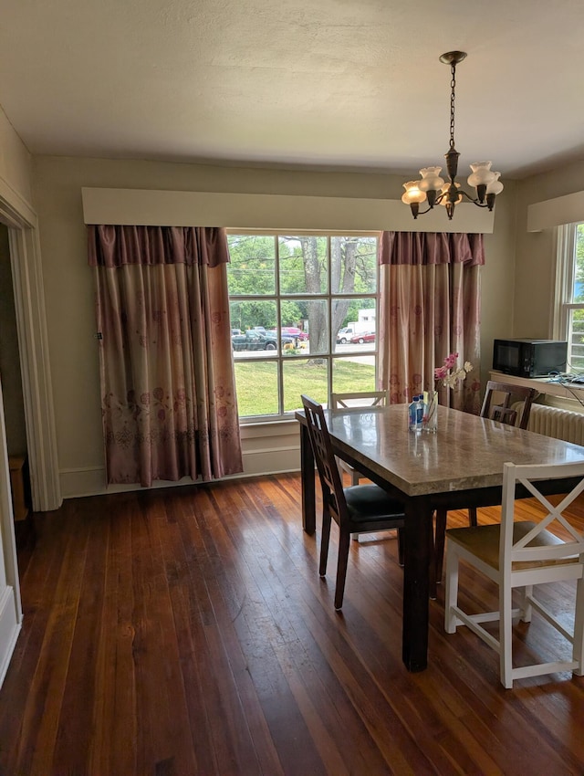 1105 Rte 390, Cresco, PA 18326 - dining area featuring a chandelier and dark wood-style floors