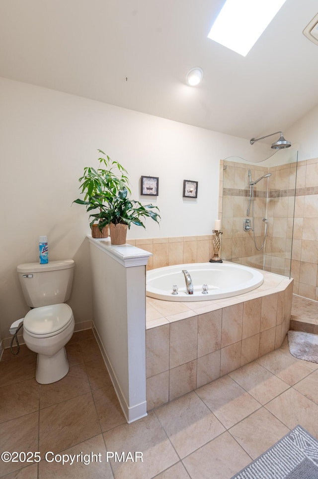 bathroom with shower with separate bathtub, tile patterned flooring, a skylight, and toilet