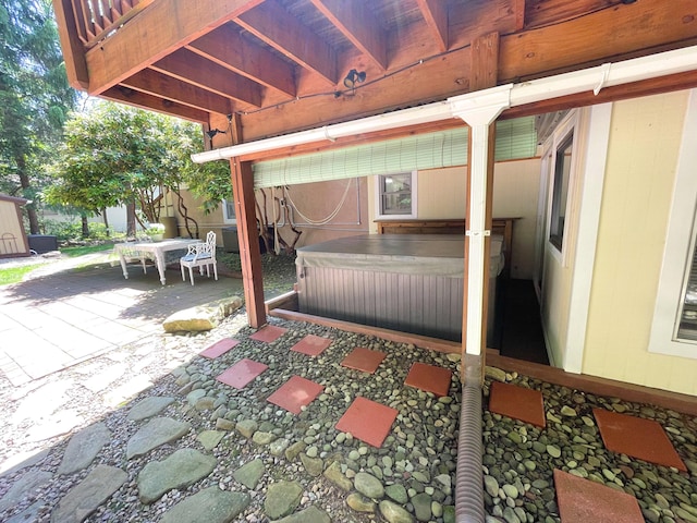 25 Cobblewood Dr, Mount Pocono, PA 18344 - view of patio featuring a hot tub