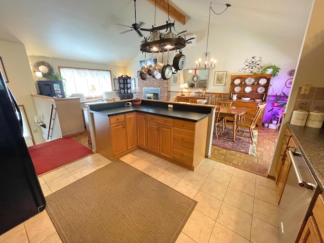 25 Cobblewood Dr, Mount Pocono, PA 18344 - kitchen with dark countertops, a fireplace, ceiling fan, open floor plan, and a chandelier