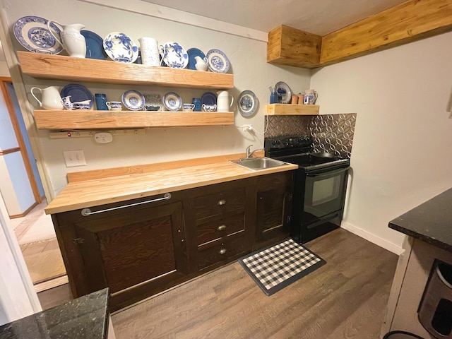 25 Cobblewood Dr, Mount Pocono, PA 18344 - kitchen with black / electric stove, open shelves, wooden counters, and dark wood-style floors