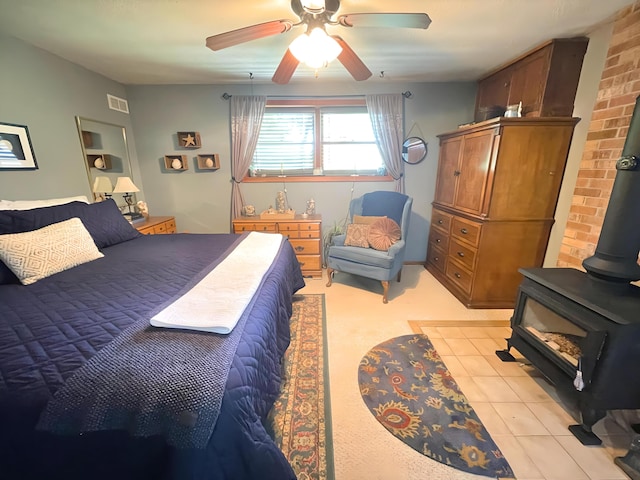 25 Cobblewood Dr, Mount Pocono, PA 18344 - bedroom featuring a wood stove and ceiling fan