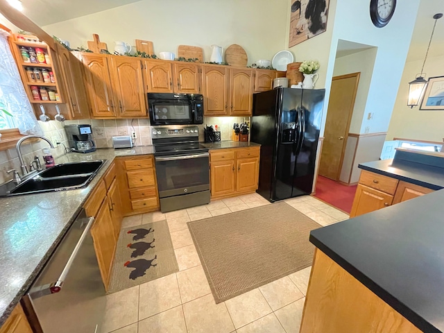 25 Cobblewood Dr, Mount Pocono, PA 18344 - kitchen featuring black appliances, backsplash, light tile patterned flooring, high vaulted ceiling, and hanging light fixtures