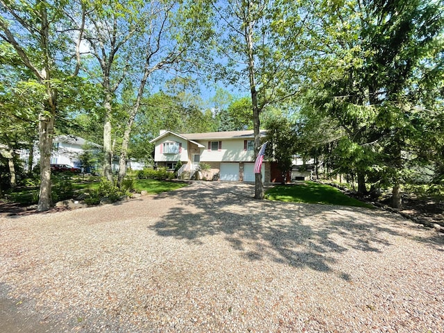 25 Cobblewood Dr, Mount Pocono, PA 18344 - bi-level home featuring a garage and driveway