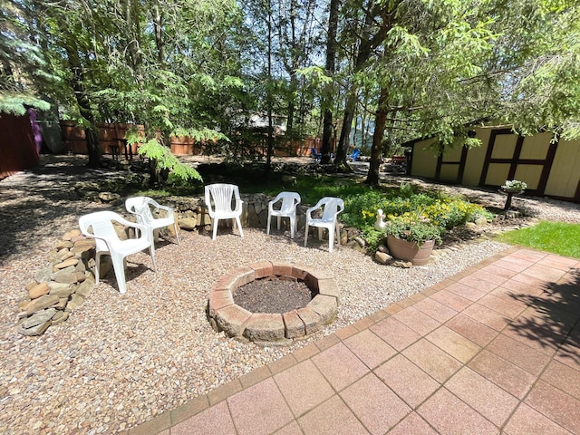 25 Cobblewood Dr, Mount Pocono, PA 18344 - view of patio / terrace with an outdoor fire pit