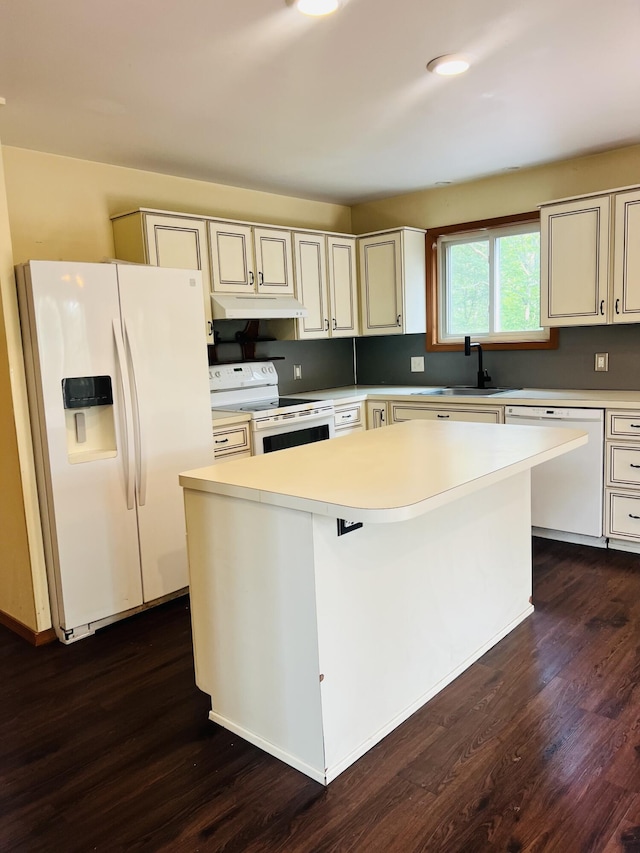 120 Totteridge Rd, Bushkill, PA 18324 - kitchen featuring white appliances, under cabinet range hood, dark wood-style floors, a center island, and light countertops