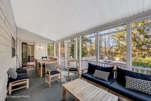 sunroom with lofted ceiling