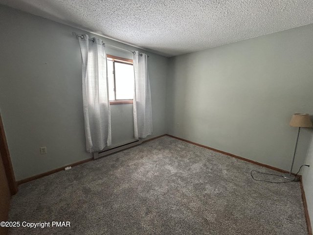 carpeted empty room with a textured ceiling, baseboards, and a baseboard radiator