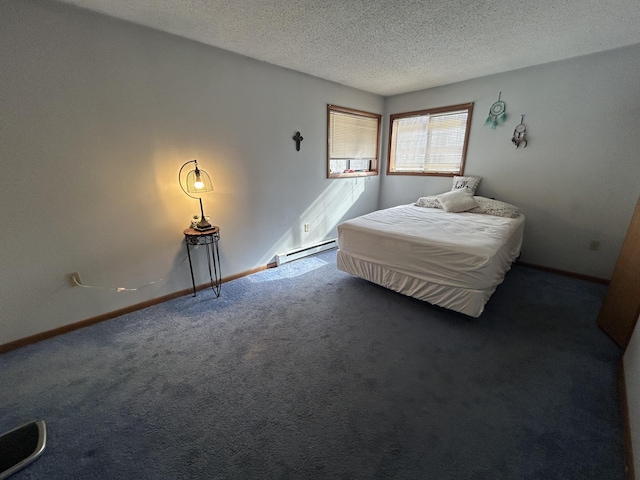 unfurnished bedroom featuring a textured ceiling, a baseboard heating unit, baseboards, and carpet floors