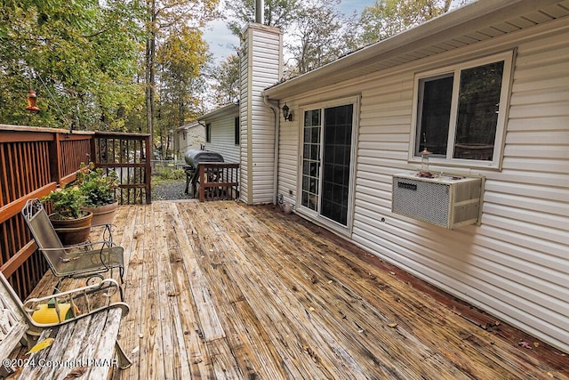 wooden deck featuring grilling area