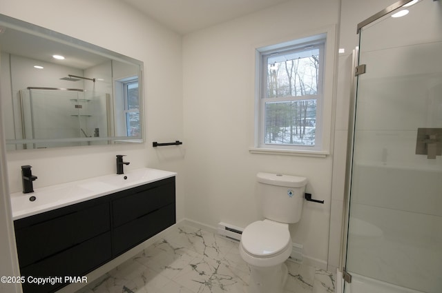 bathroom with toilet, a sink, baseboards, marble finish floor, and a stall shower