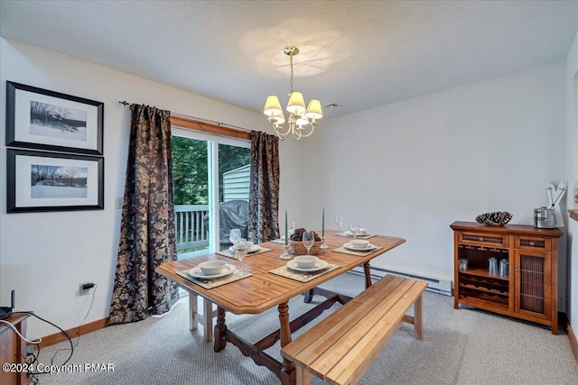 dining room featuring a chandelier, light carpet, visible vents, baseboards, and baseboard heating