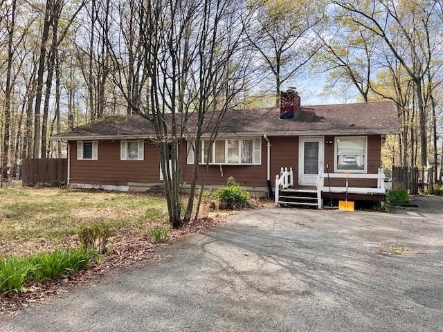 2121 Sassafras Ln, Kunkletown, PA 18058 - single story home featuring fence and a chimney