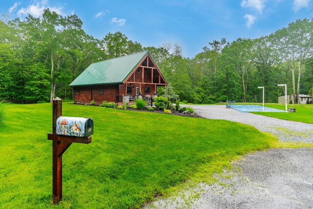 65 Poho Cir, Lehighton, PA 18235 - view of front of property with a front yard, a metal roof, and a forest view