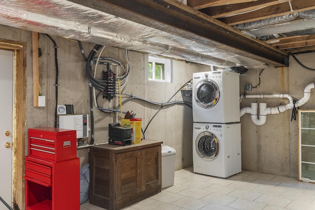 65 Poho Cir, Lehighton, PA 18235 - laundry area featuring estacked washer and dryer and tile patterned floors