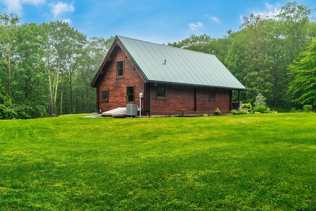 65 Poho Cir, Lehighton, PA 18235 - view of side of home with a lawn, a metal roof, and a wooded view