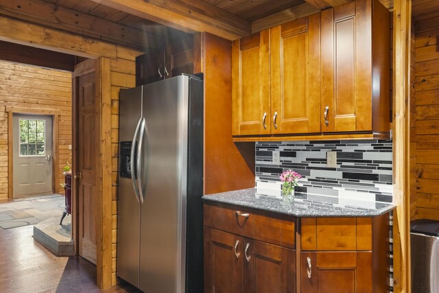 65 Poho Cir, Lehighton, PA 18235 - kitchen with stainless steel fridge with ice dispenser, decorative backsplash, stone countertops, wood finished floors, and brown cabinetry