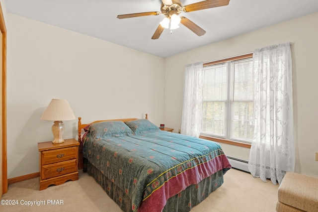 104 Merriment Ln, Blakeslee, PA 18610 - bedroom featuring carpet, baseboard heating, baseboards, and ceiling fan