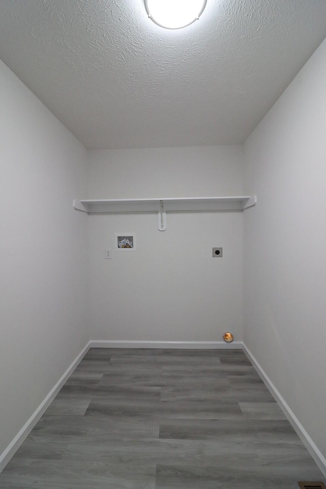 8305 Utopia Ln, East Stroudsburg, PA 18302 - washroom featuring electric dryer hookup, hookup for a washing machine, baseboards, and wood finished floors