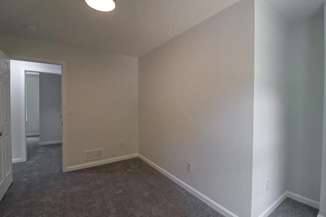8305 Utopia Ln, East Stroudsburg, PA 18302 - unfurnished room with baseboards and dark colored carpet
