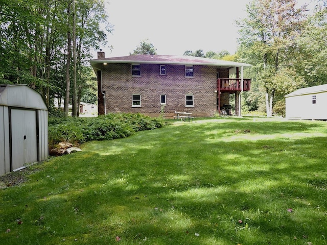 98 Black Bear Pass, White Haven, PA 18661 - rear view of house with a chimney, a lawn, and brick siding