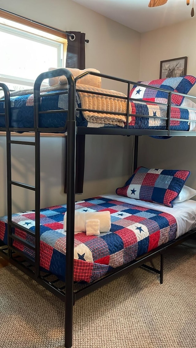 bedroom featuring carpet