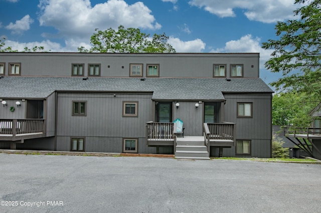 view of front of home with roof with shingles