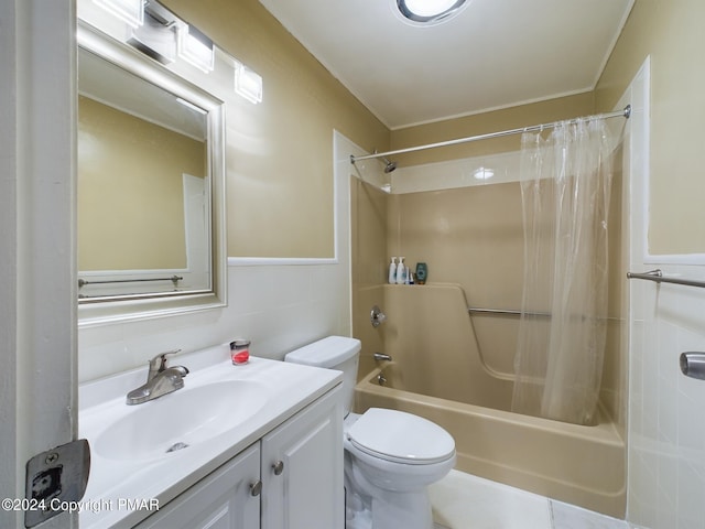 full bath featuring tile walls, toilet, shower / bathtub combination with curtain, and vanity