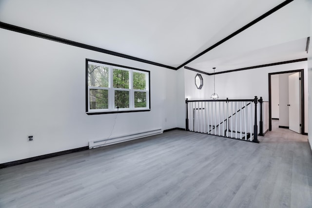 8066 Red Squirrel Dr, Tobyhanna, PA 18466 - bonus room featuring a baseboard radiator, lofted ceiling, baseboards, and wood finished floors
