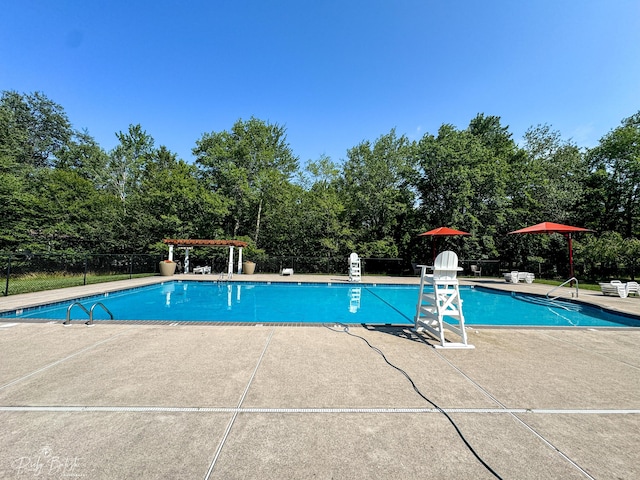 8066 Red Squirrel Dr, Tobyhanna, PA 18466 - community pool featuring a patio area and fence