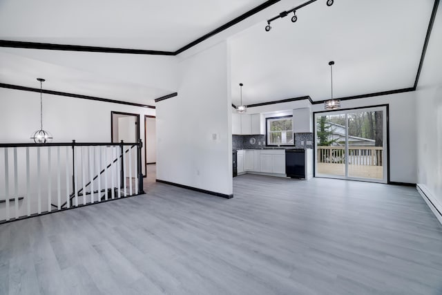 8066 Red Squirrel Dr, Tobyhanna, PA 18466 - unfurnished living room featuring lofted ceiling, a notable chandelier, baseboards, crown molding, and light wood-style floors