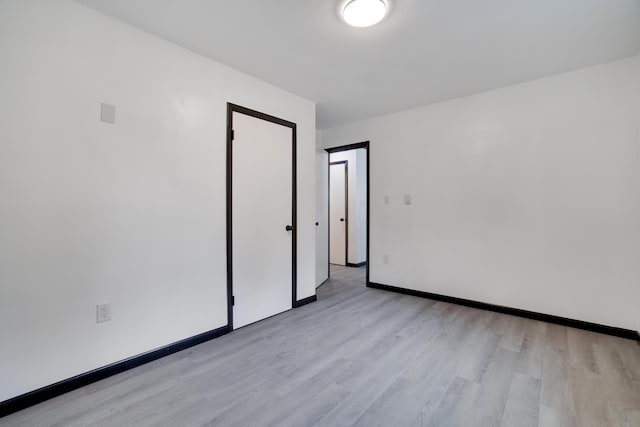 8066 Red Squirrel Dr, Tobyhanna, PA 18466 - unfurnished room featuring baseboards and light wood finished floors