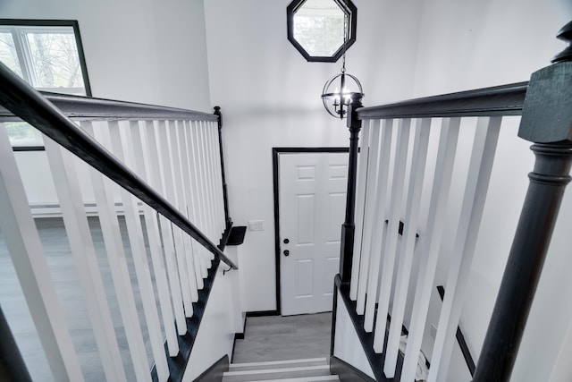 8066 Red Squirrel Dr, Tobyhanna, PA 18466 - stairway featuring wood finished floors and a healthy amount of sunlight
