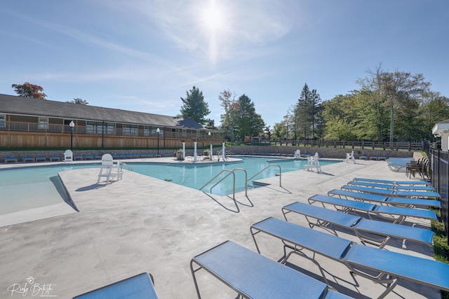 8066 Red Squirrel Dr, Tobyhanna, PA 18466 - community pool with a patio area and fence