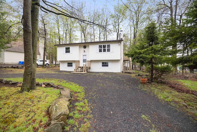 8066 Red Squirrel Dr, Tobyhanna, PA 18466 - view of front of home featuring entry steps and stucco siding