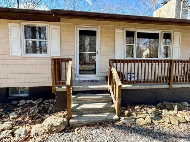 8 Tulip Ln, Thornhurst, PA 18424 - property entrance with covered porch