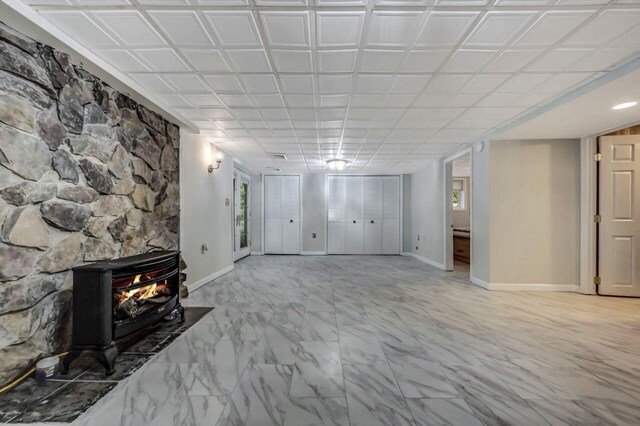 14 Ace Ln, East Stroudsburg, PA 18301 - unfurnished living room with baseboards and marble look tile flooring