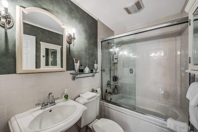14 Ace Ln, East Stroudsburg, PA 18301 - full bathroom with bath / shower combo with glass door, toilet, a sink, and tile walls