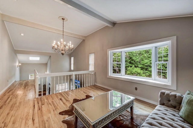 14 Ace Ln, East Stroudsburg, PA 18301 - living room featuring wood finished floors, healthy amount of natural light, a chandelier, and baseboards