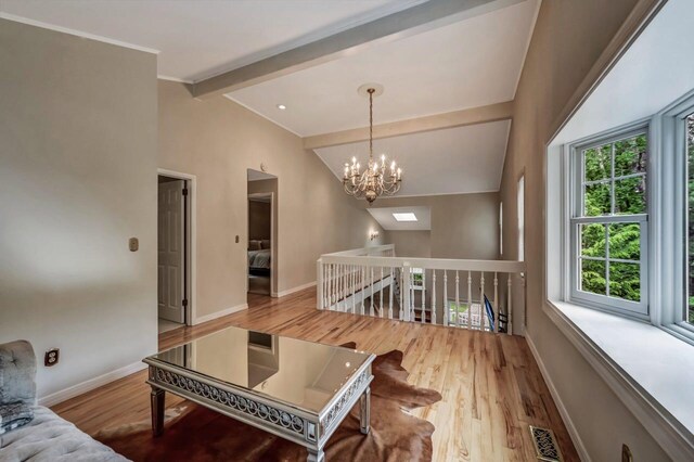 14 Ace Ln, East Stroudsburg, PA 18301 - living area with wood finished floors, baseboards, and a chandelier