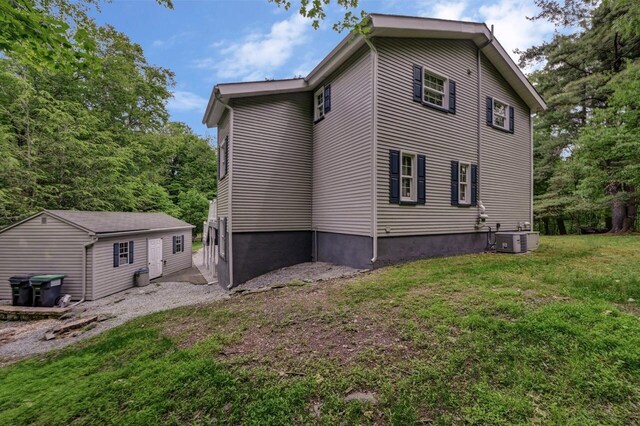 14 Ace Ln, East Stroudsburg, PA 18301 - view of side of home with central air condition unit and a lawn