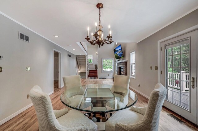 14 Ace Ln, East Stroudsburg, PA 18301 - dining room with plenty of natural light, a chandelier, light wood-style floors, crown molding, and recessed lighting