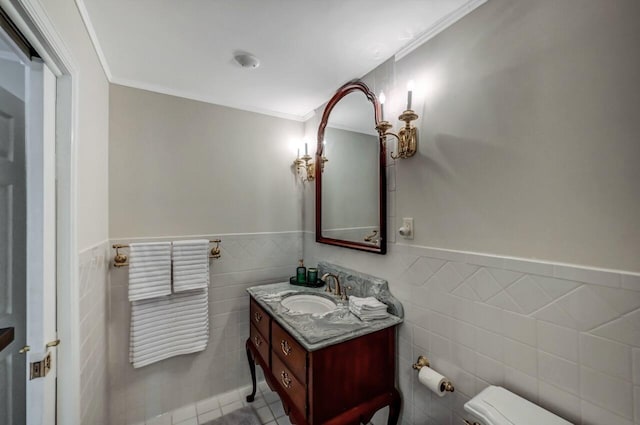 14 Ace Ln, East Stroudsburg, PA 18301 - half bathroom with vanity, toilet, tile walls, a wainscoted wall, and crown molding