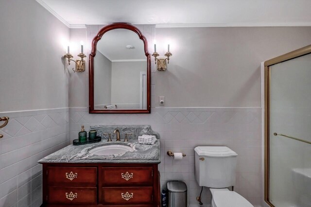 14 Ace Ln, East Stroudsburg, PA 18301 - full bath with tile walls, toilet, vanity, a shower stall, and wainscoting