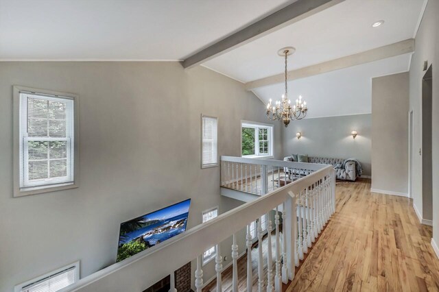 14 Ace Ln, East Stroudsburg, PA 18301 - corridor featuring a chandelier, an upstairs landing, wood finished floors, and baseboards