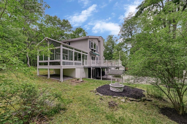 14 Ace Ln, East Stroudsburg, PA 18301 - rear view of house with a sunroom and a wooden deck