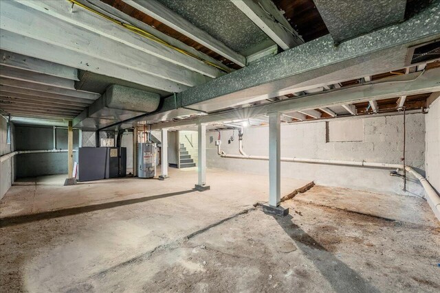 428 Shook Ave, Stroudsburg, PA 18360 - unfinished below grade area featuring water heater and stairway