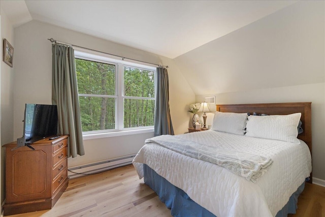 71 Pope Ln, Albrightsville, PA 18210 - bedroom with lofted ceiling, light wood finished floors, and baseboard heating