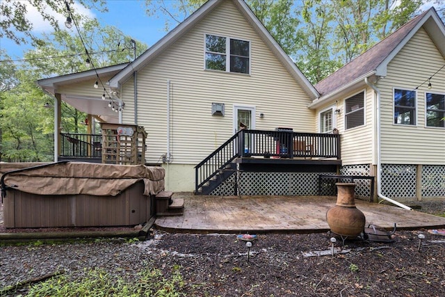 71 Pope Ln, Albrightsville, PA 18210 - rear view of property with a hot tub, a deck, a patio area, and stairs